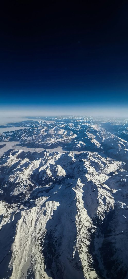 高空航拍雪山群手机壁纸 云海蓝天壮阔884×1920竖屏高清壁纸